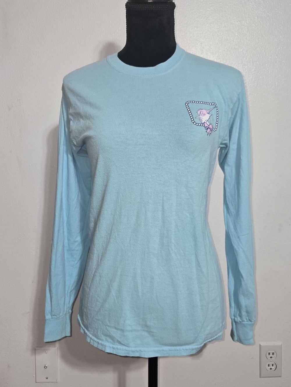Light Blue Long-Sleeve Women's Crew Tee with Small Chest Graphic